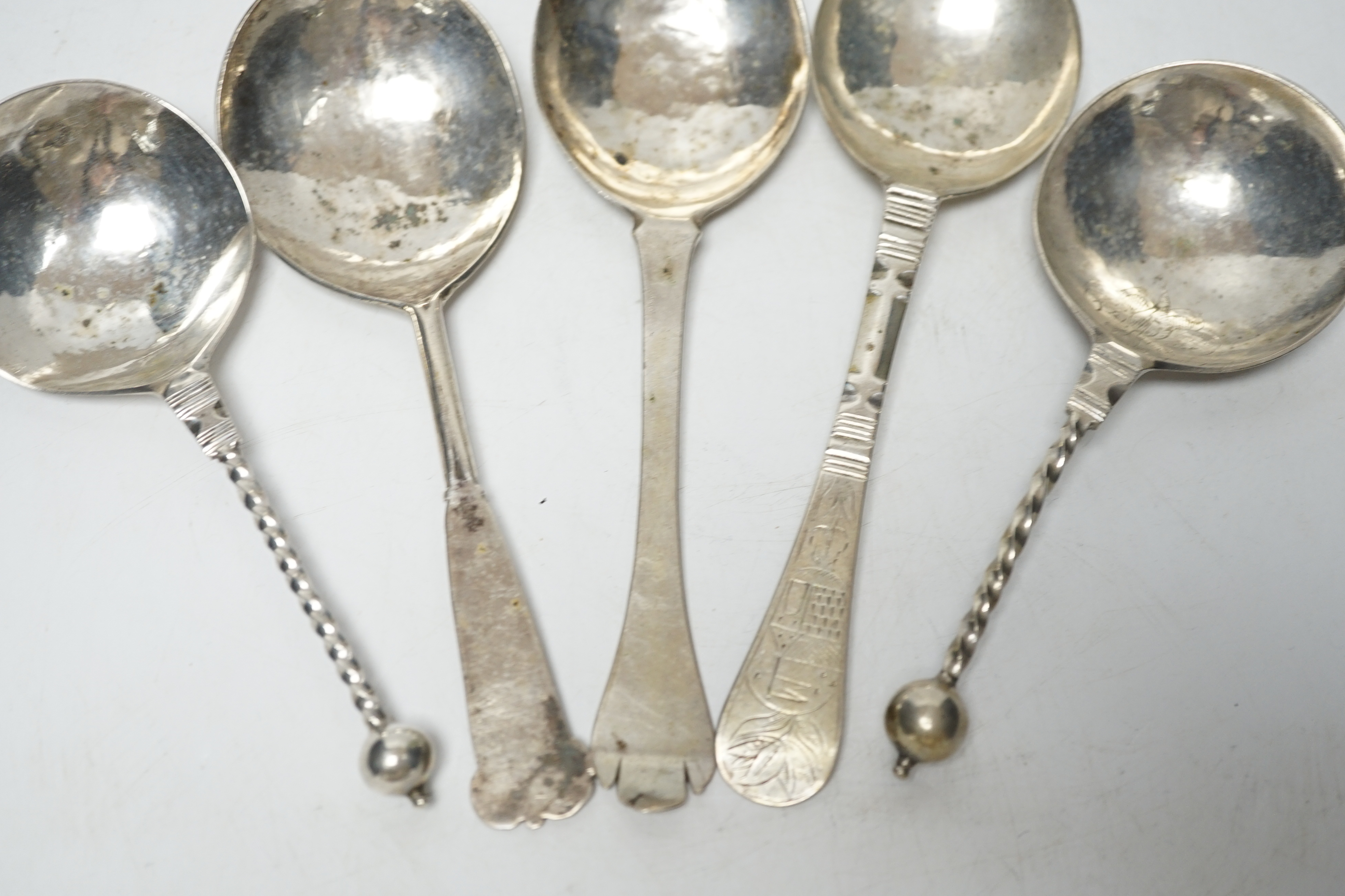 Five assorted 19th century and later Scandinavian? white metal spoons, two with maker's marks, largest 18cm.